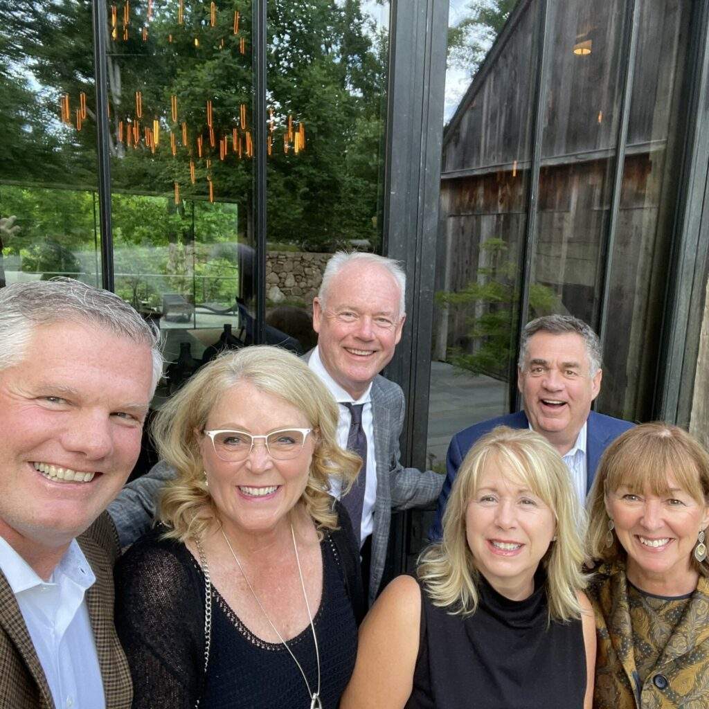 The Dufenhorsts, the Johnsons, and the Oppenheimers, all smiling.