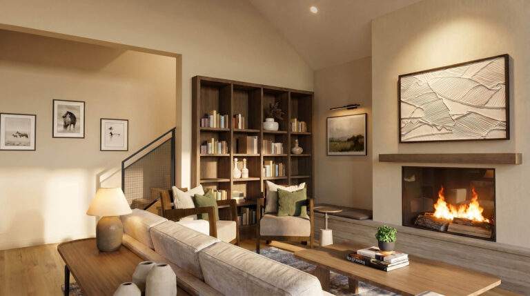 A modern living room with a fireplace, built-in bookshelves, a beige sofa, armchairs, and framed wall art offers serene comfort—perfect for enjoying vineyard views reminiscent of Rocky Pond Estate in North Central Washington.